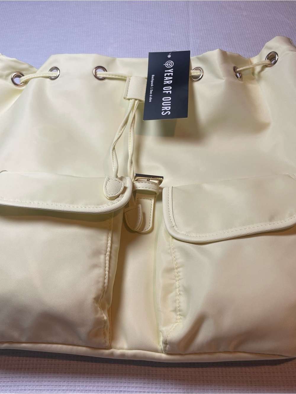 Year of Ours Ivory Drawstring Backpack Front Pockets Gold Hardware Medium
